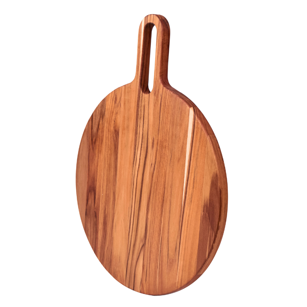 Round teakwood serving board with a long handle and rich wood grain isolated on a white background.