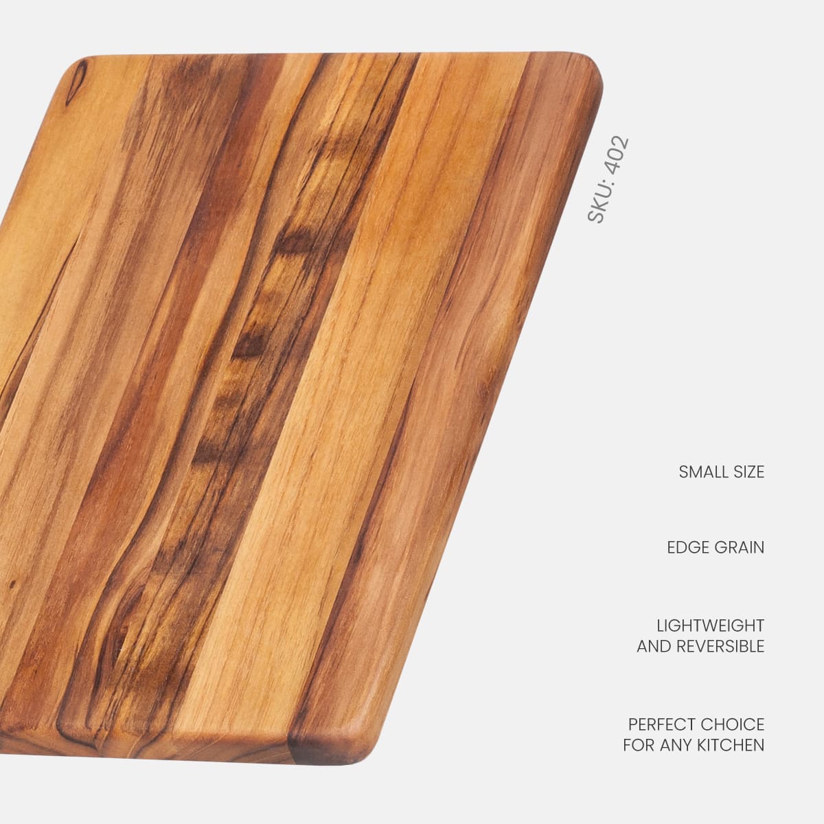Small edge grain teak wood cutting board featuring its lightweight, reversible design for daily kitchen prep.