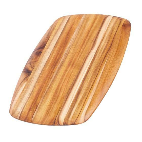 Teakhaus rounded edges teakwood serving board with a natural edge grain finish for elegant food display.