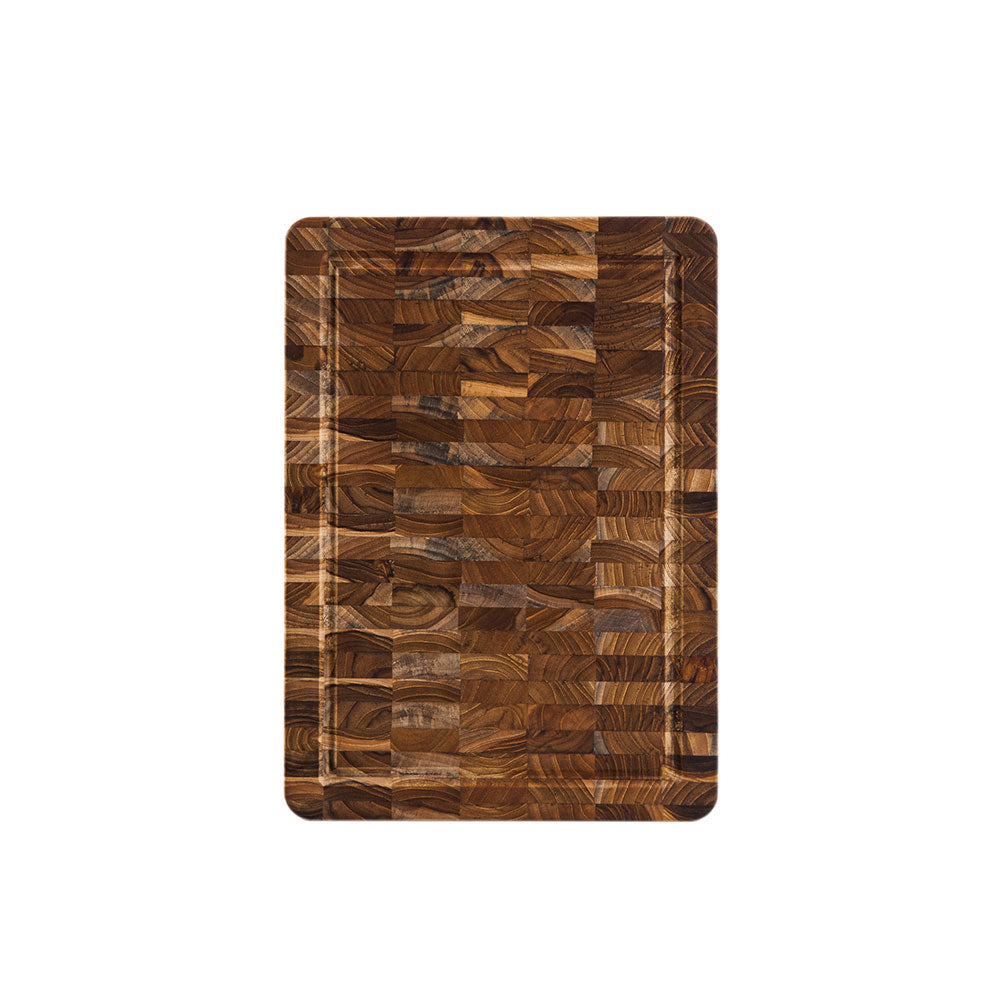Thin lightweight end grain teakwood cutting board with a perimeter juice canal.