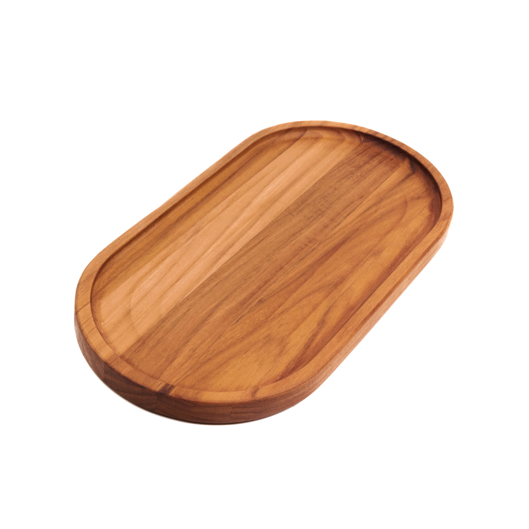 Medium teakwood oval serving tray featuring an edge grain construction and a narrow rim on a white background.