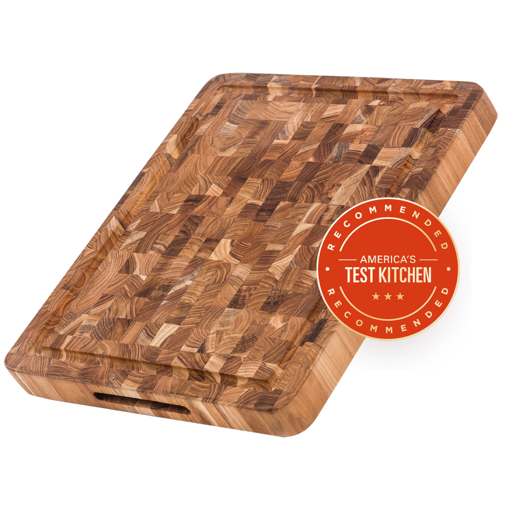 Wooden cutting board with 'America's Test Kitchen' recommended badge on a white background