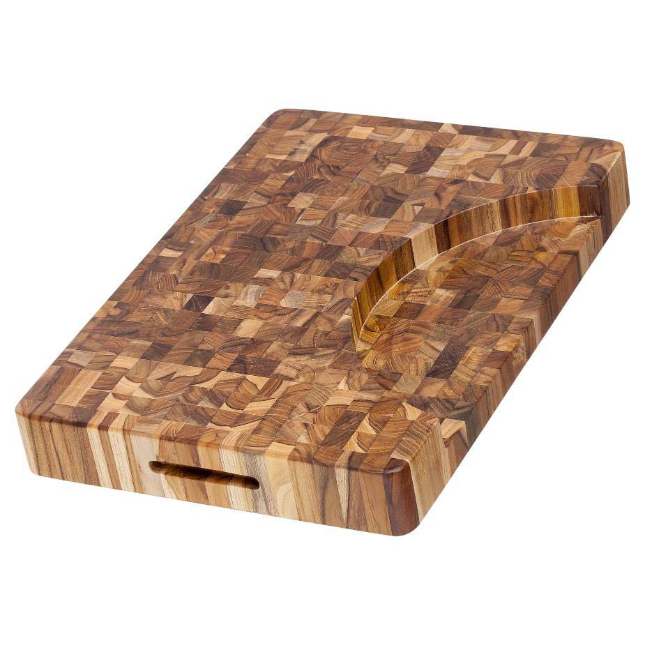 Extra thick end grain teak butcher block featuring a curved plate cutout and integrated side hand grips.